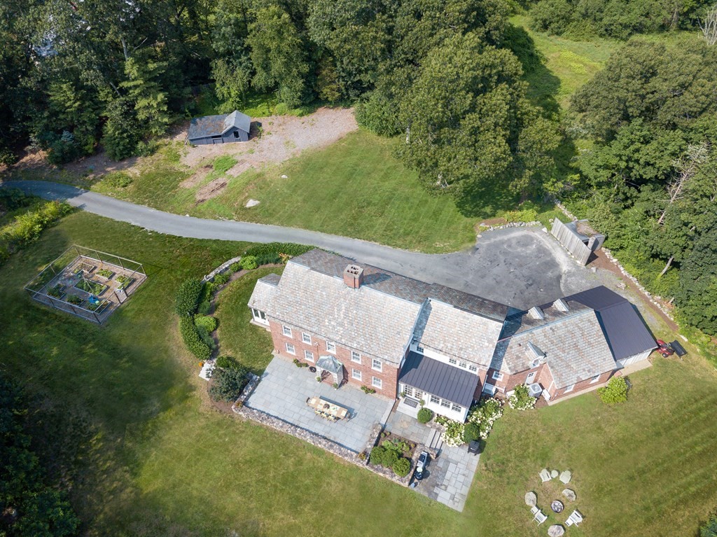35 Sandy Pond Road Lincoln, MA 01773 - Photo 39 of 40 an aerial view of a house with a yard