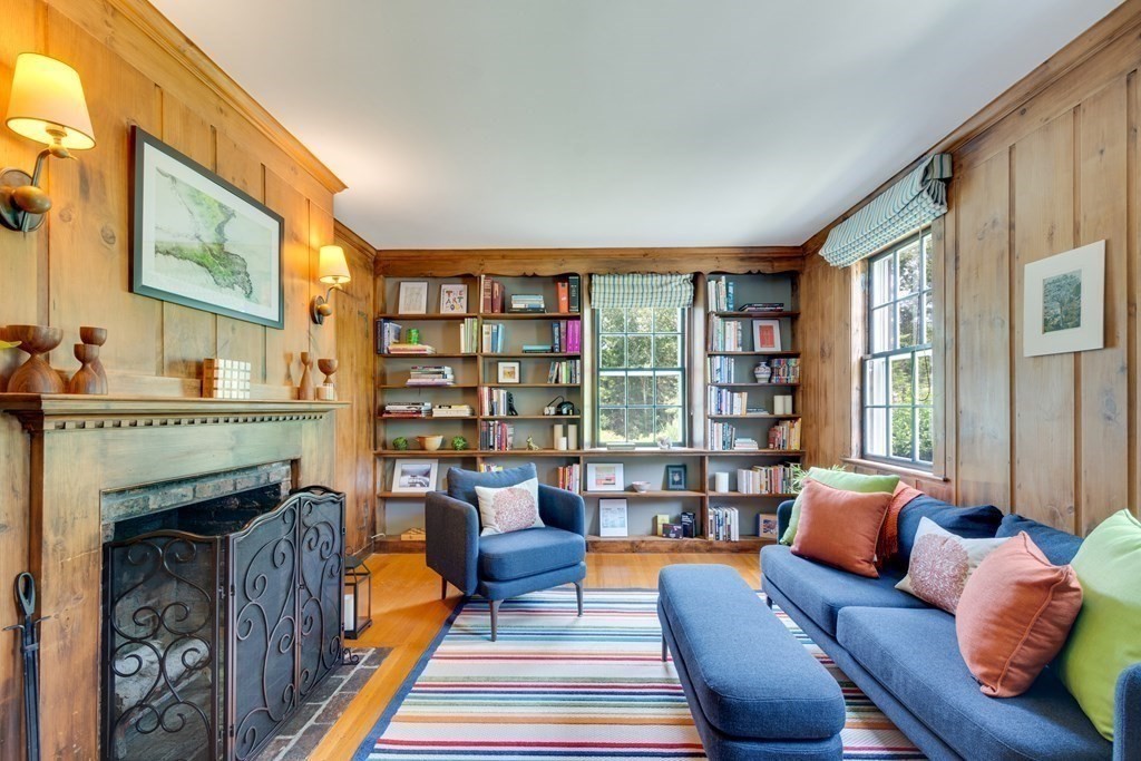 35 Sandy Pond Road Lincoln, MA 01773 - Photo 7 of 40 a living room with furniture and a fireplace