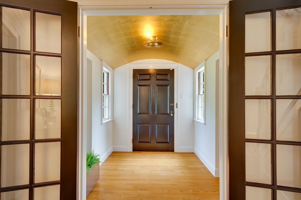 35 Sandy Pond Road Lincoln, MA 01773 - Photo 8 of 40 a view of a hallway with painted walls