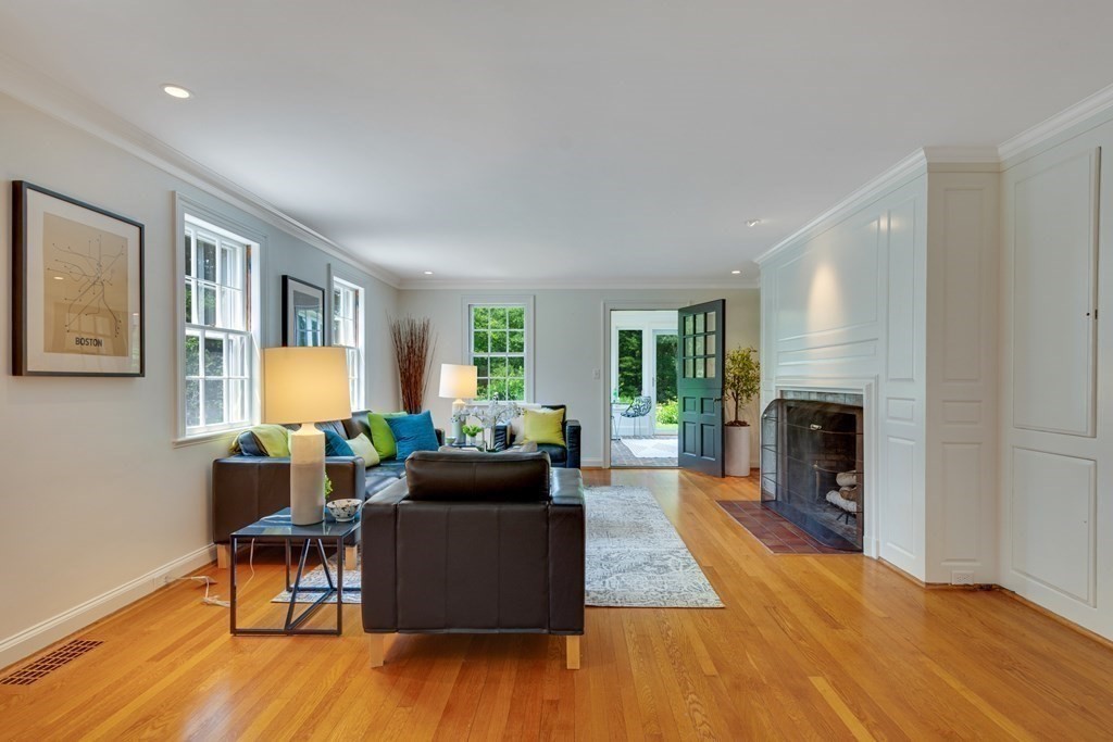 35 Sandy Pond Road Lincoln, MA 01773 - Photo 10 of 40 a living room with furniture and a fireplace