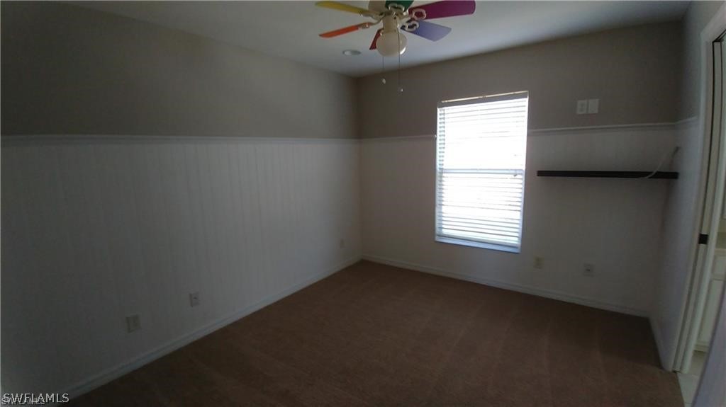 12835 Timber Ridge Drive Fort Myers, FL 33913 - Photo 1 of 2 an empty room with a window