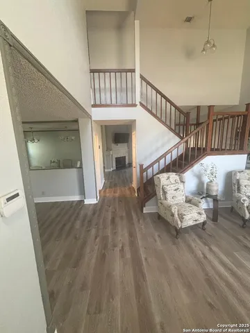 a view of livingroom with furniture and stairs