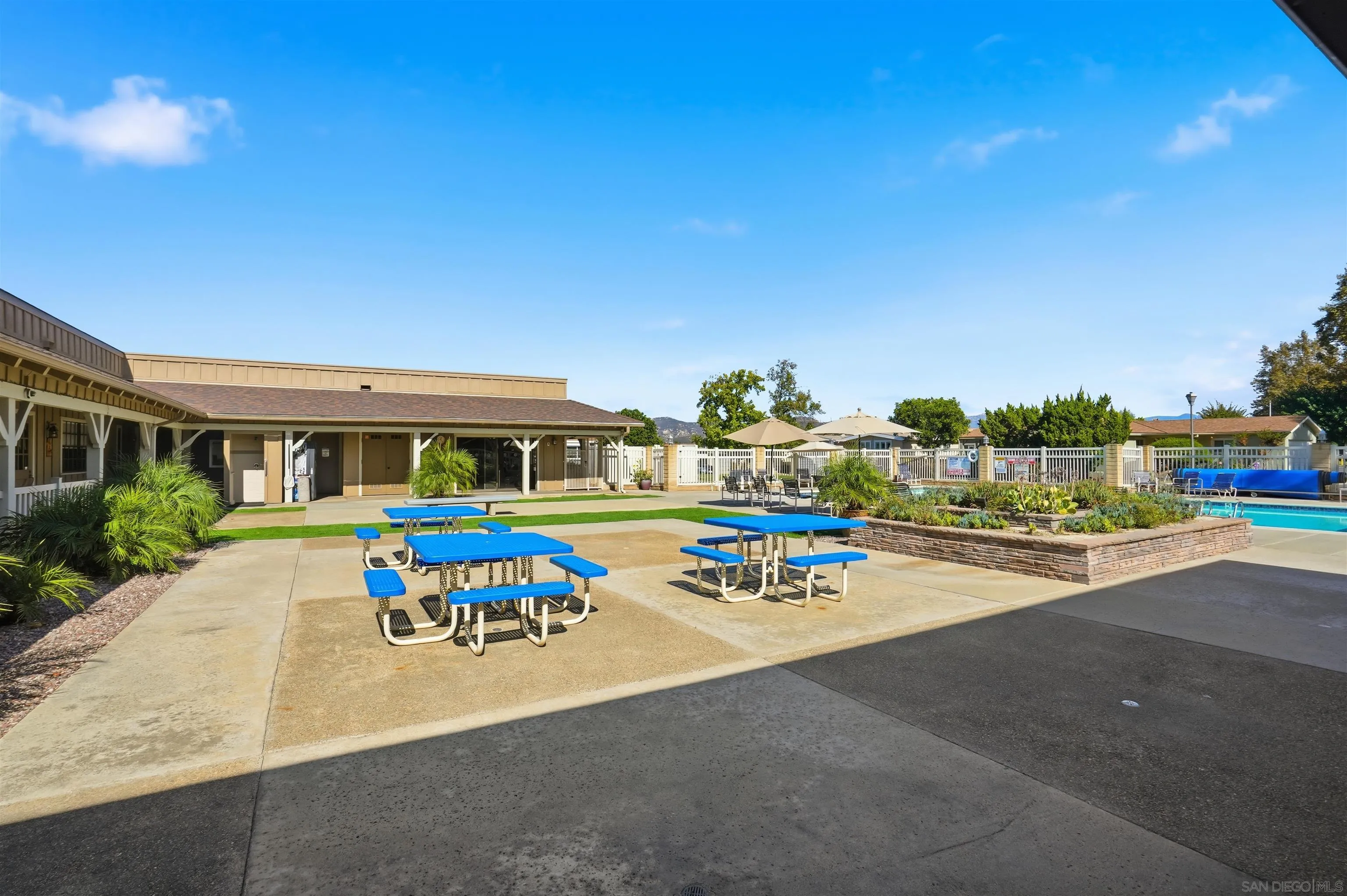 9255 North Magnolia Avenue, Unit 339 Santee, CA 92071 - Photo 41 of 51 a front view of building with outdoor seating