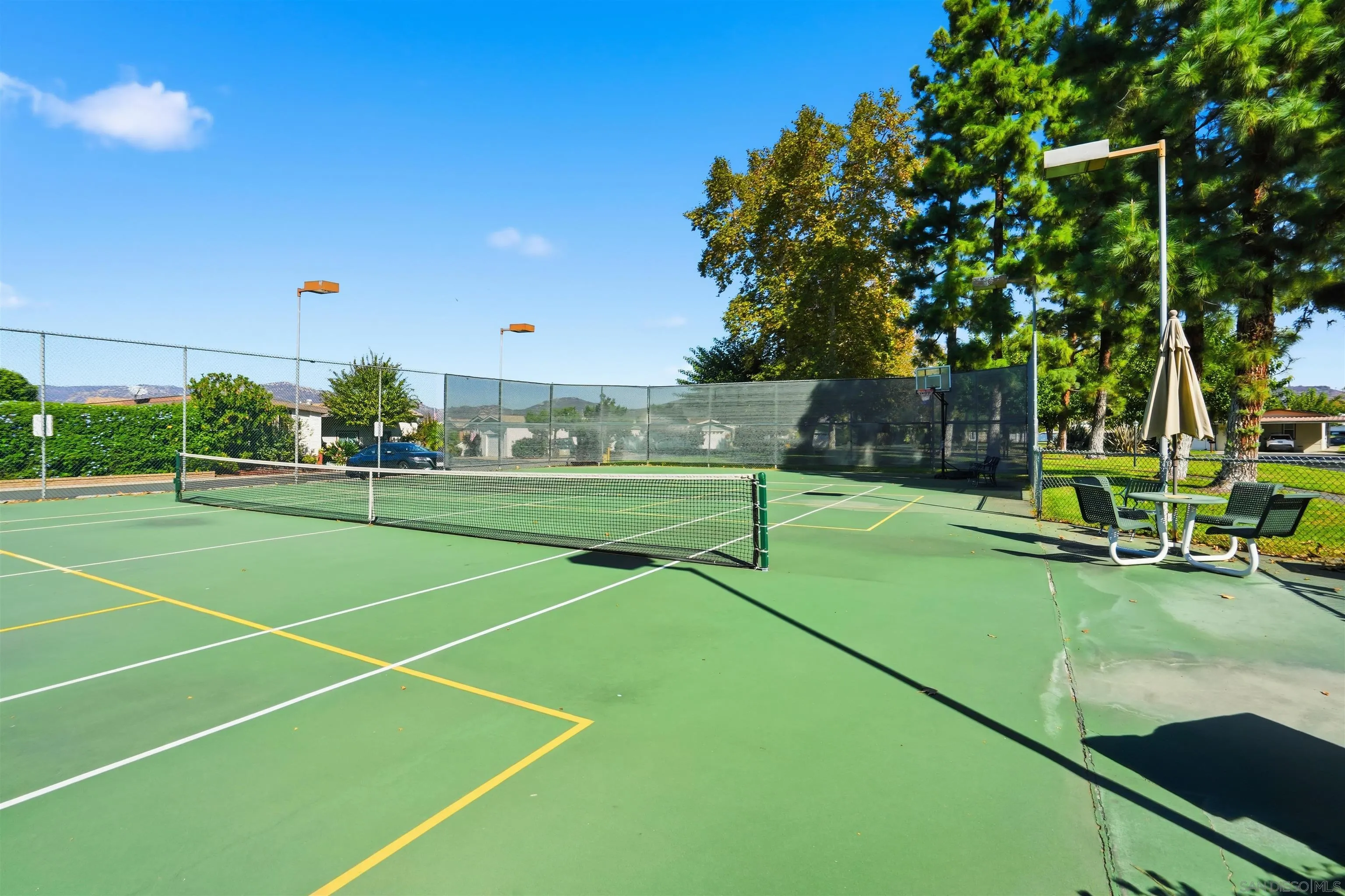9255 North Magnolia Avenue, Unit 339 Santee, CA 92071 - Photo 44 of 51 a view of a tennis court