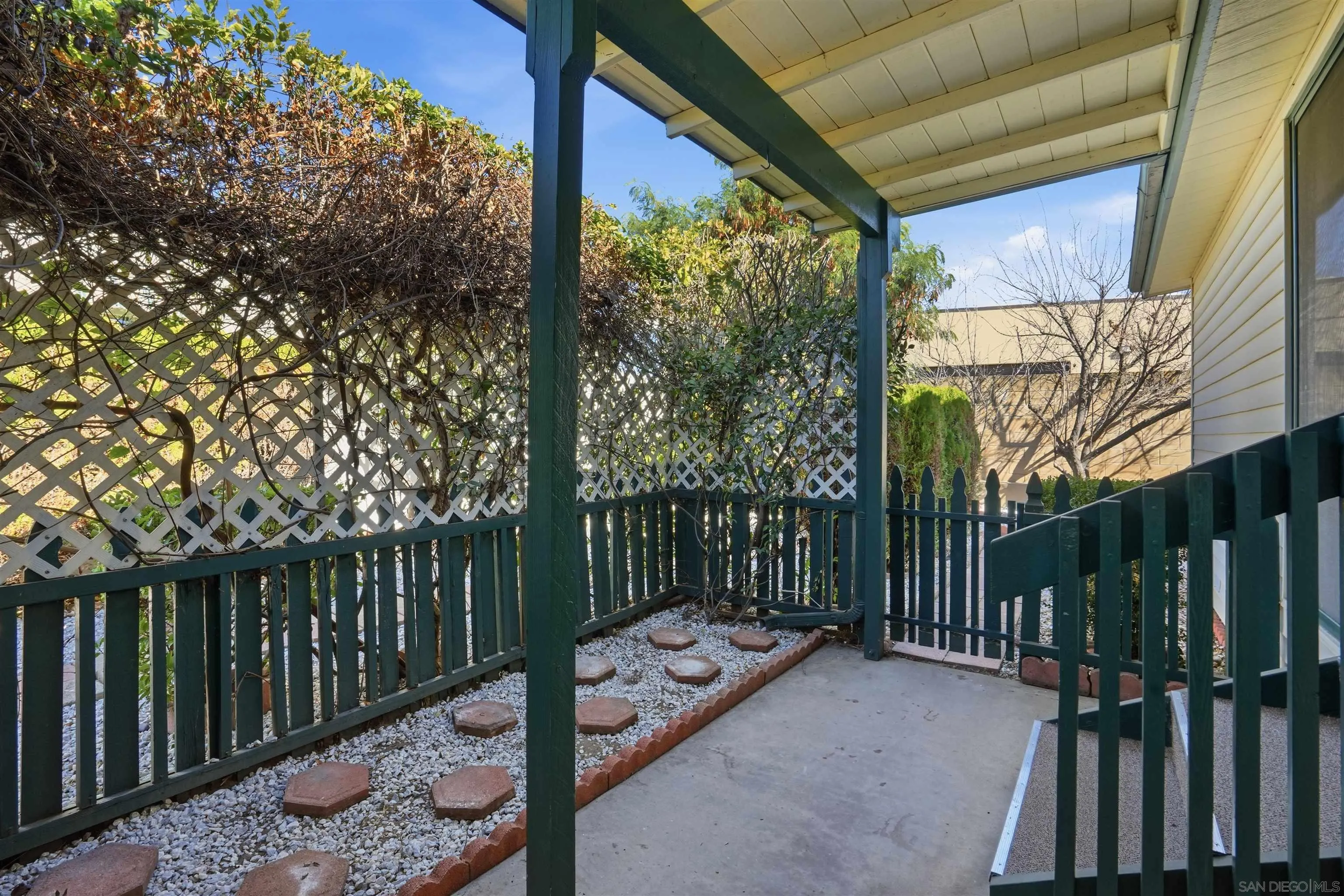 9255 North Magnolia Avenue, Unit 339 Santee, CA 92071 - Photo 6 of 51 a view of a two chairs in the porch