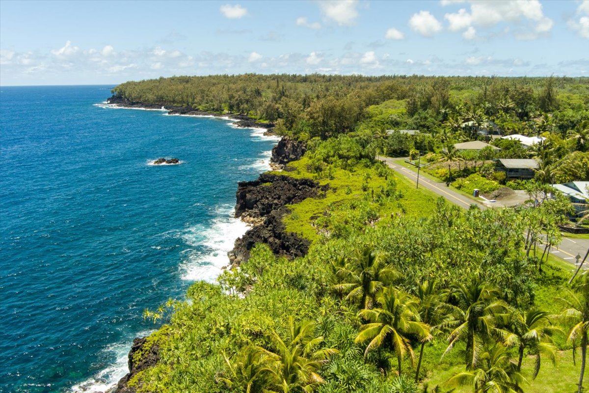 15-175 North Lot 1763 Puni Lapa Loop Pahoa, HI 96778 - Photo 13 of 18 a view of a lake with a yard