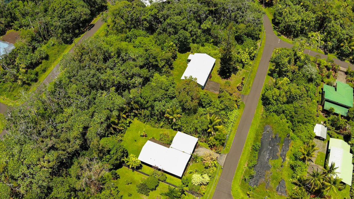 15-175 North Lot 1763 Puni Lapa Loop Pahoa, HI 96778 - Photo 4 of 18 a view of a house with a yard and sitting area