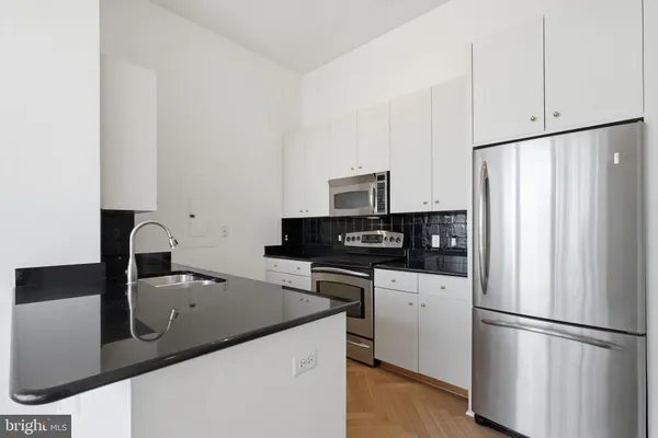 $710,000 | 520 John Carlyle Street, Unit 408, Alexandria, VA 22314
