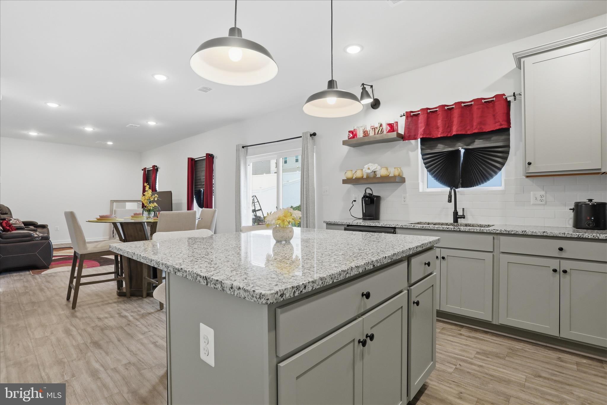 76 Diving Scaup Road Hedgesville, WV 25427 - Photo 8 of 48 a kitchen with a sink cabinets and wooden floor