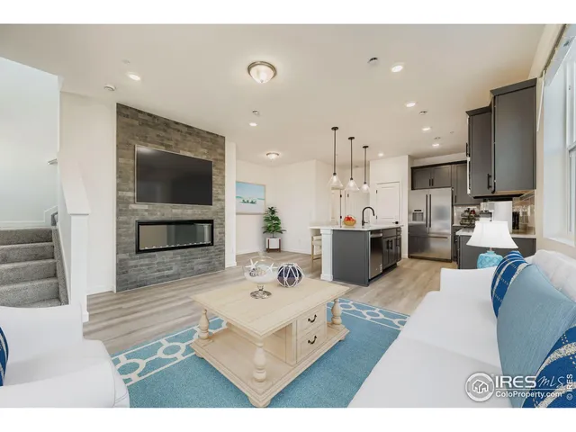 a bedroom with a bed and a television