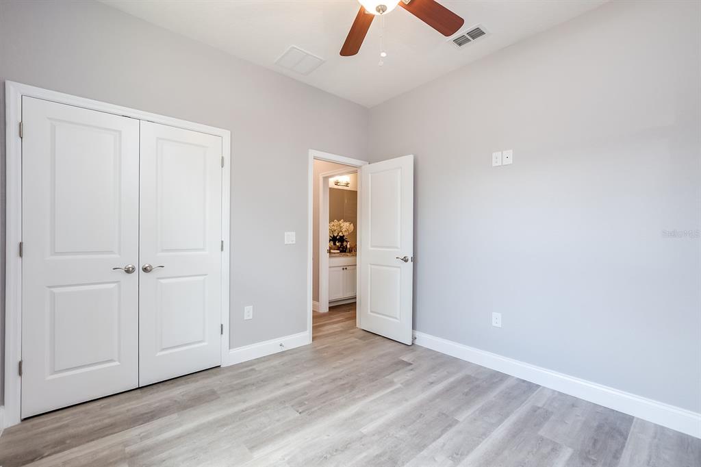 621 Paddock Street Orlando, FL 32833 - Photo 24 of 25 wooden floor in an empty room with a window