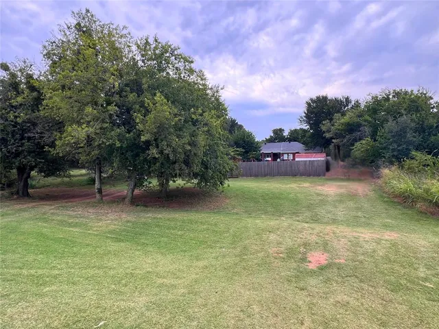 a view of a backyard with a garden