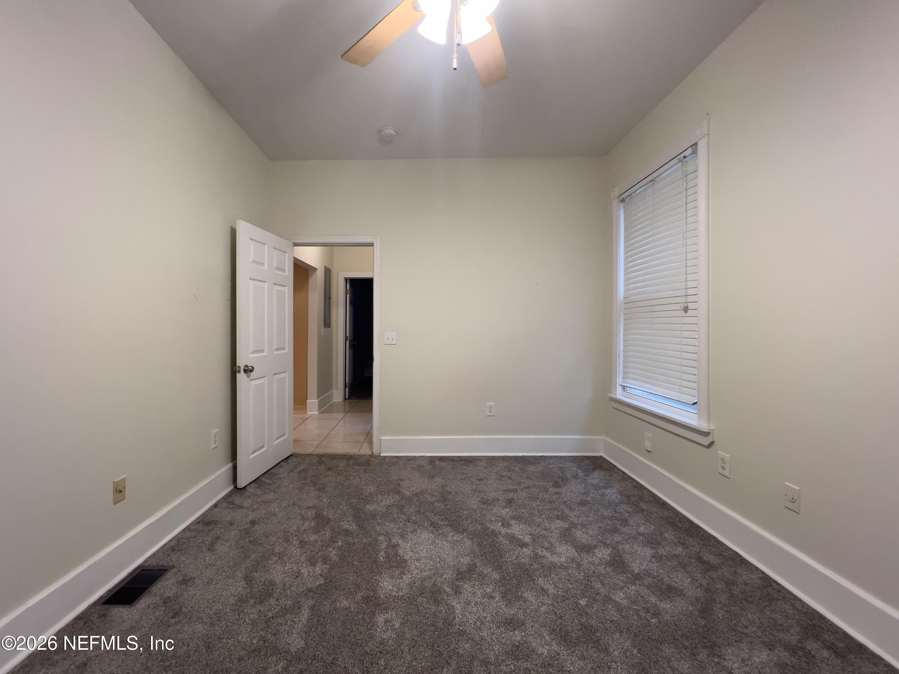 1425 Silver Street Jacksonville, FL 32206 - Photo 11 of 20 an empty room with a empty space and a window
