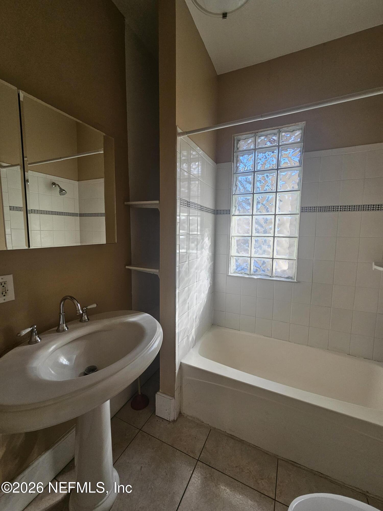 1425 Silver Street Jacksonville, FL 32206 - Photo 16 of 20 a bathroom with a sink and a bathtub