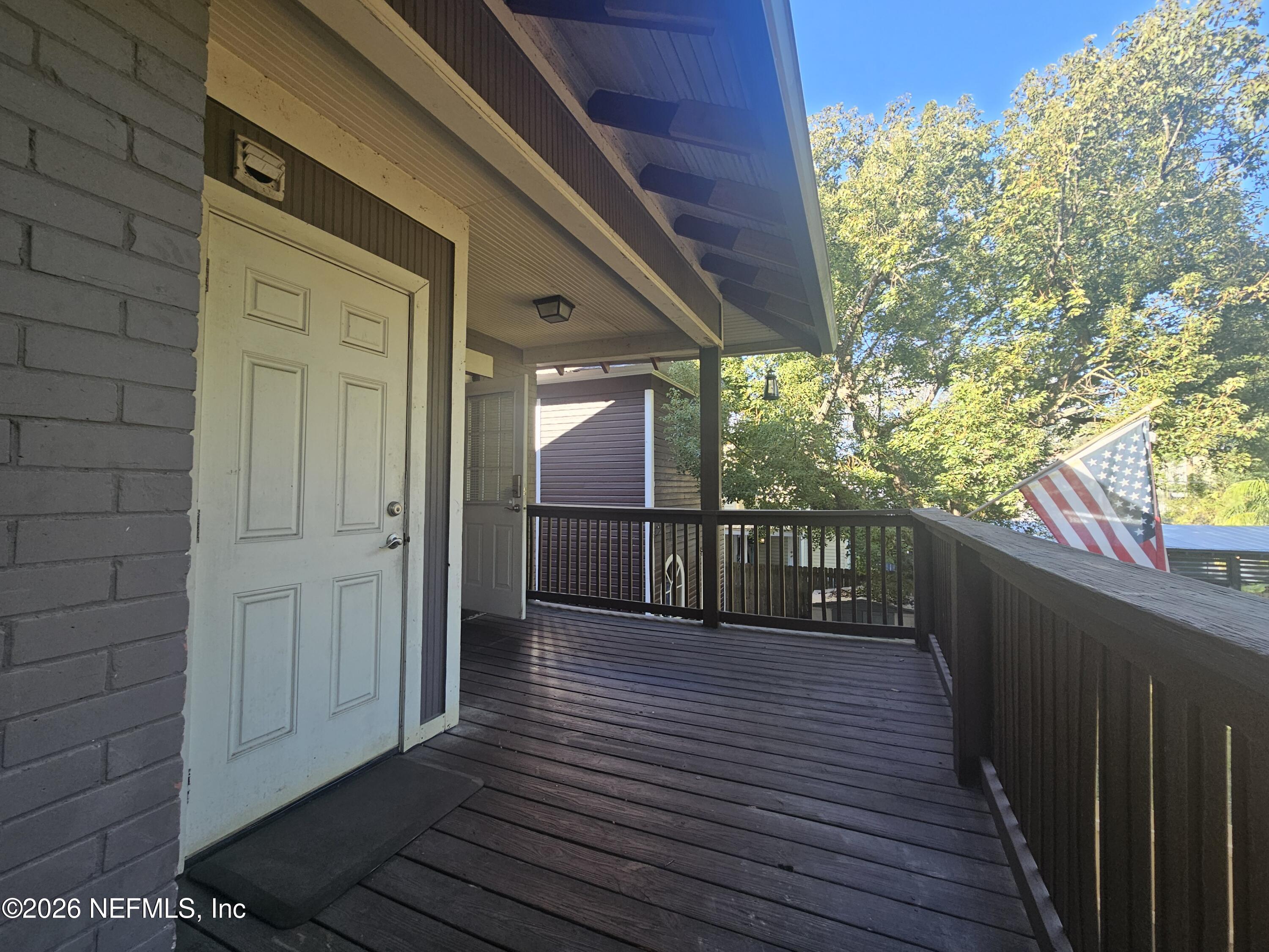 1425 Silver Street Jacksonville, FL 32206 - Photo 7 of 20 a view of a balcony with wooden floor