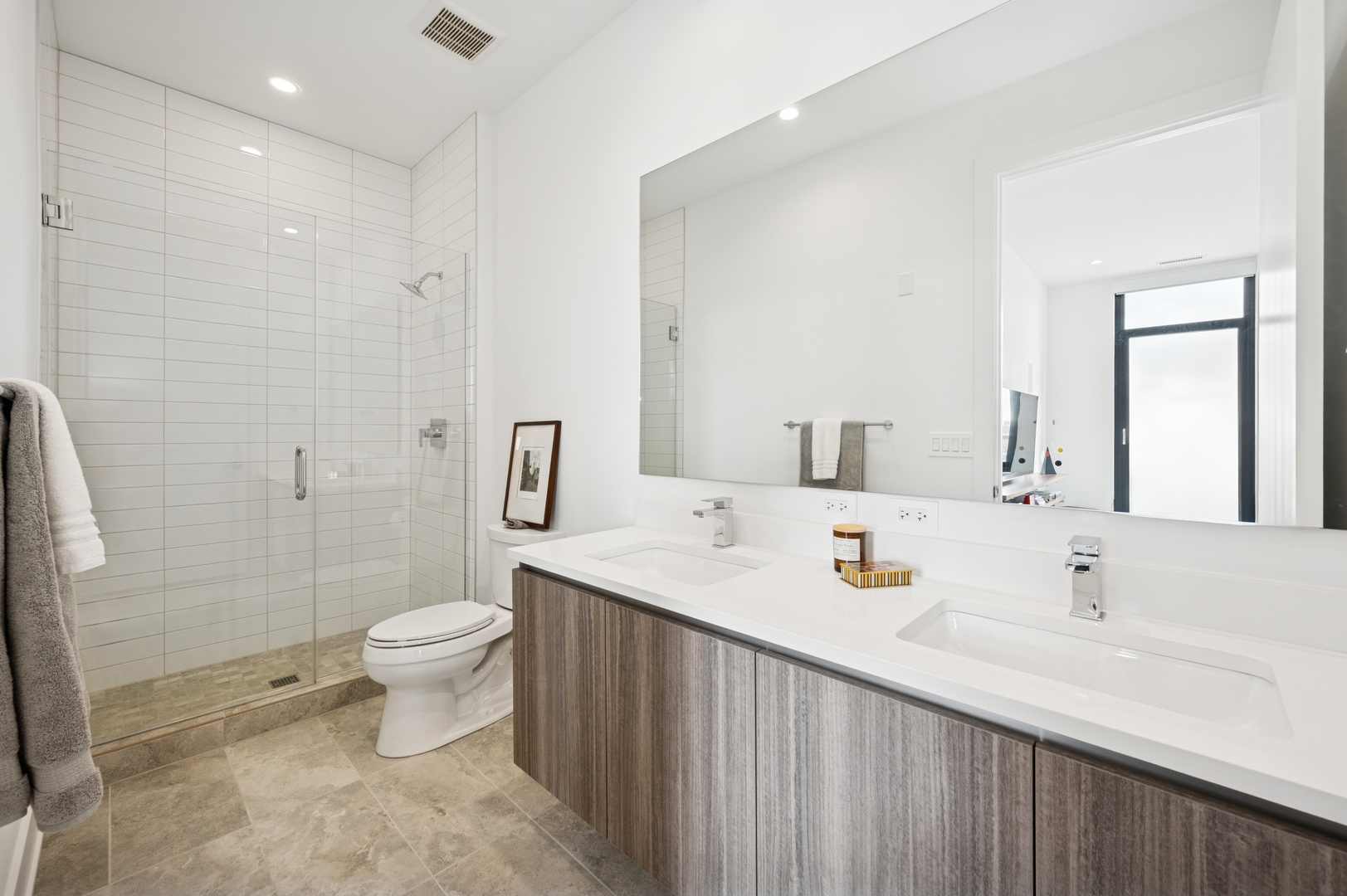 6 North Bishop Street, Unit 401 Chicago, IL 60607 - Photo 29 of 45 a bathroom with a sink toilet and shower