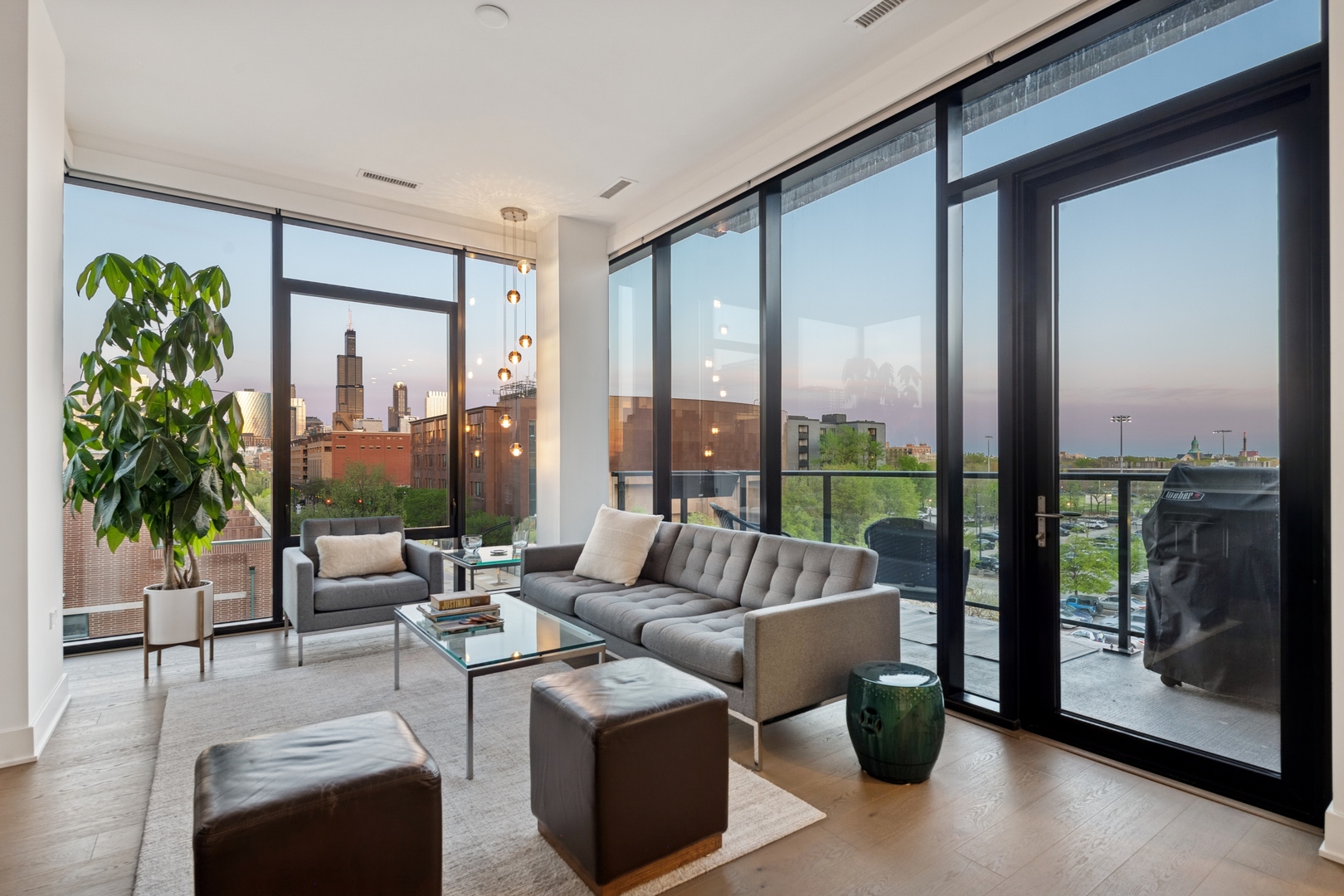 6 North Bishop Street, Unit 401 Chicago, IL 60607 - Photo 39 of 45 a living room with furniture and a floor to ceiling window