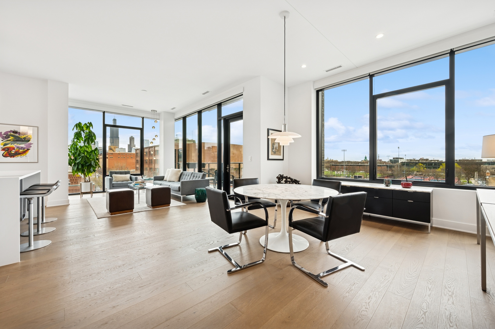 6 North Bishop Street, Unit 401 Chicago, IL 60607 - Photo 6 of 45 a living room with furniture window and wooden floor