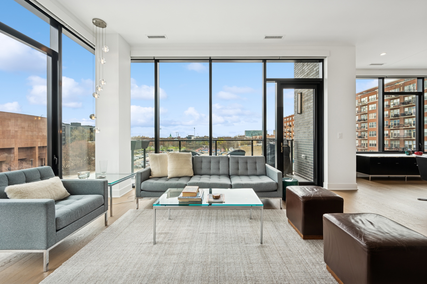 6 North Bishop Street, Unit 401 Chicago, IL 60607 - Photo 9 of 45 a living room with furniture and a large window