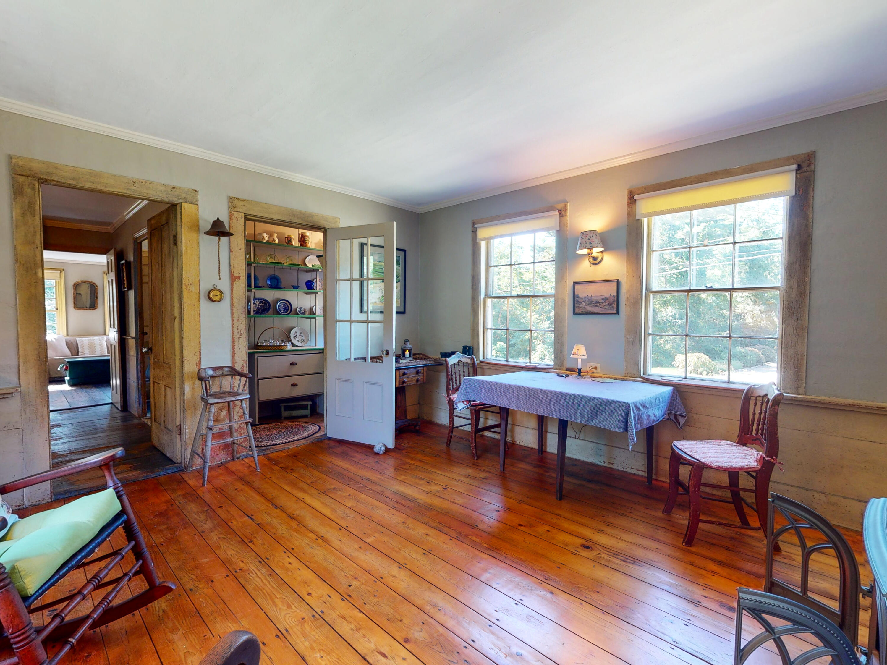 115 Cove Road Wellfleet, MA 02667 - Photo 16 of 49 a room with furniture wooden floor and a window