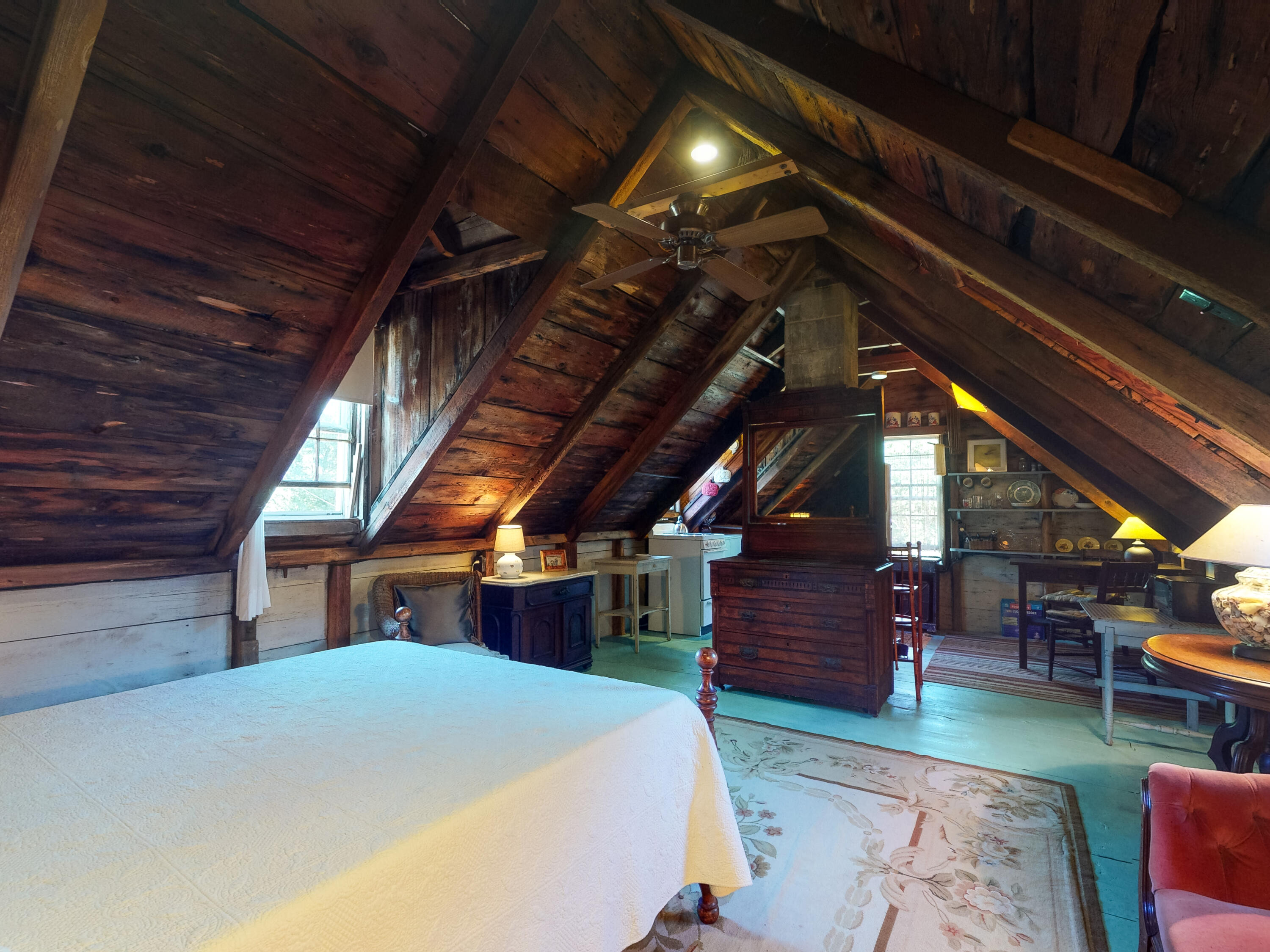 115 Cove Road Wellfleet, MA 02667 - Photo 25 of 49 a view of a room with wooden chairs and stairs