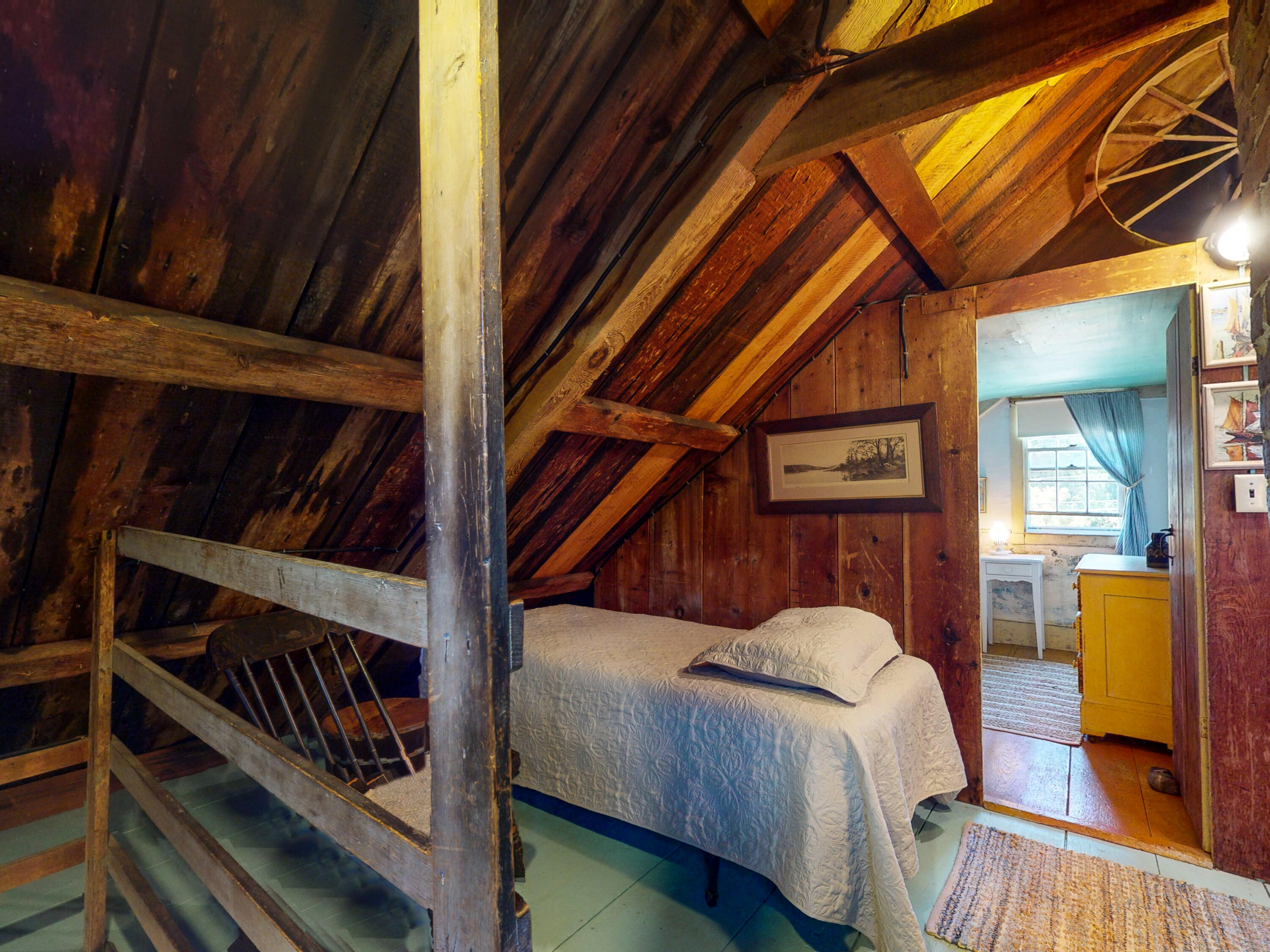 115 Cove Road Wellfleet, MA 02667 - Photo 29 of 49 a bed sitting in a bedroom next to a window