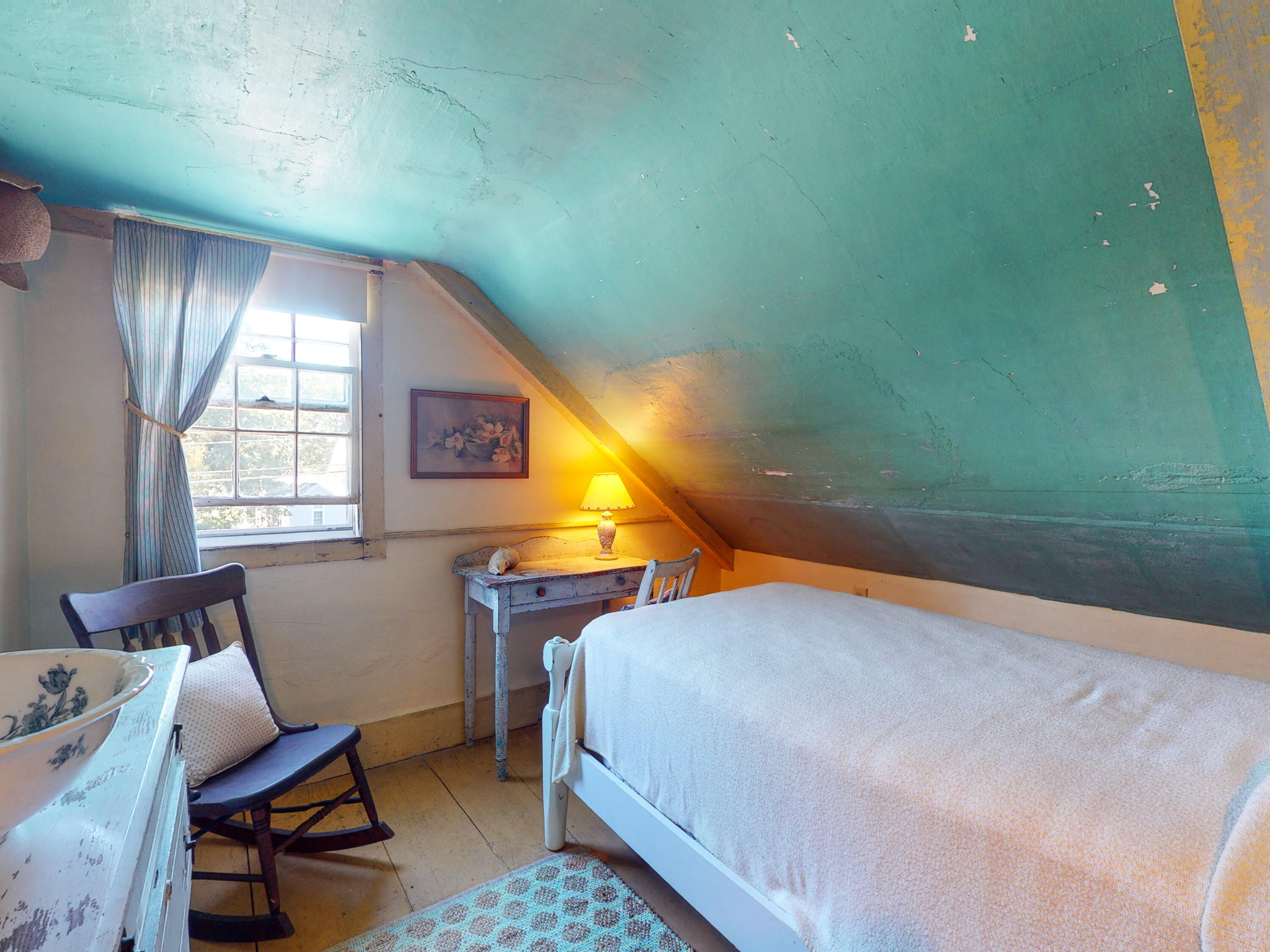 115 Cove Road Wellfleet, MA 02667 - Photo 30 of 49 a bedroom with a bed and a window