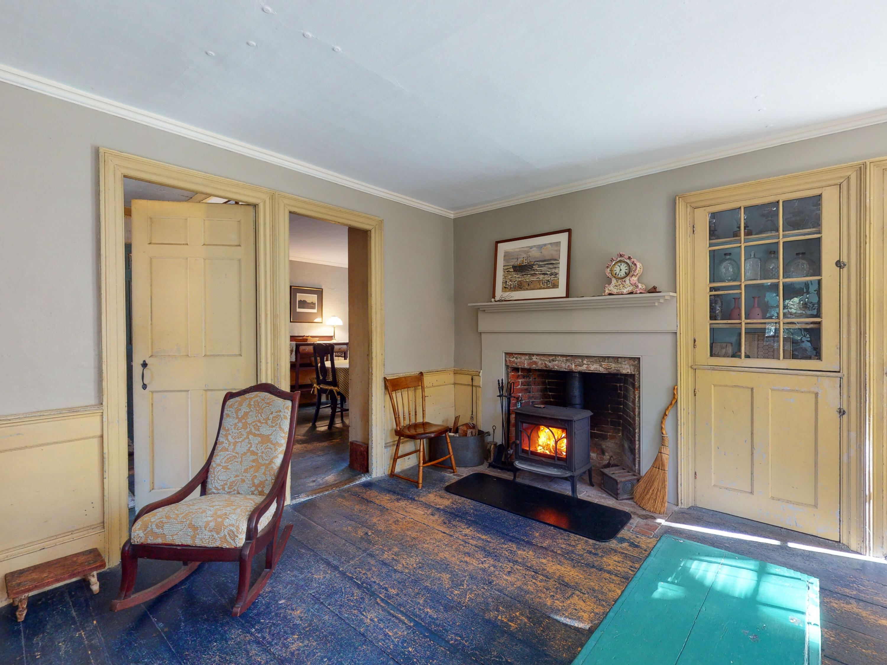 115 Cove Road Wellfleet, MA 02667 - Photo 4 of 49 a living room with furniture and a fireplace