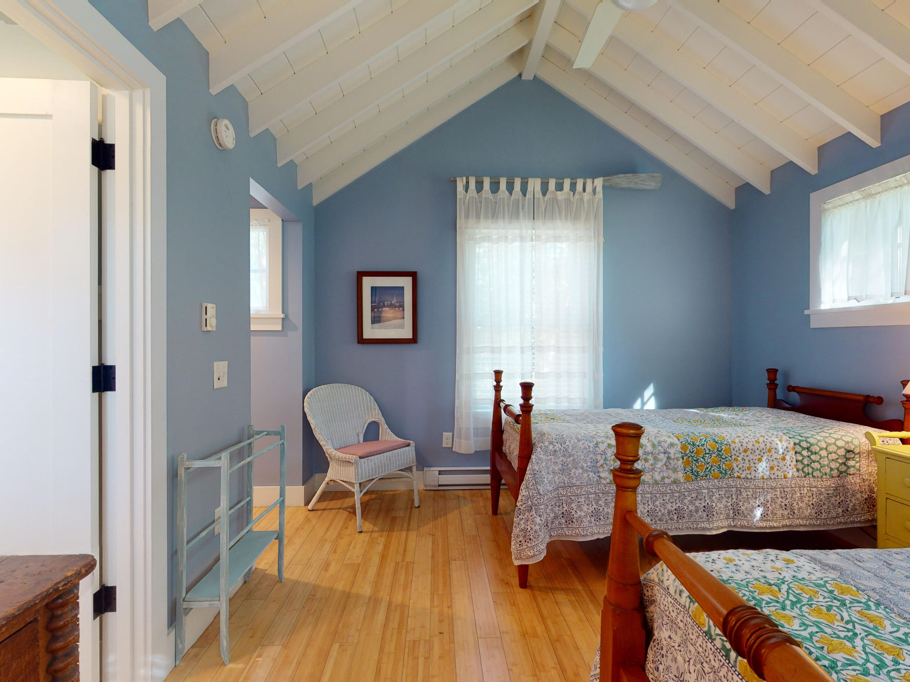 115 Cove Road Wellfleet, MA 02667 - Photo 39 of 49 a bedroom with two beds and a wooden floor