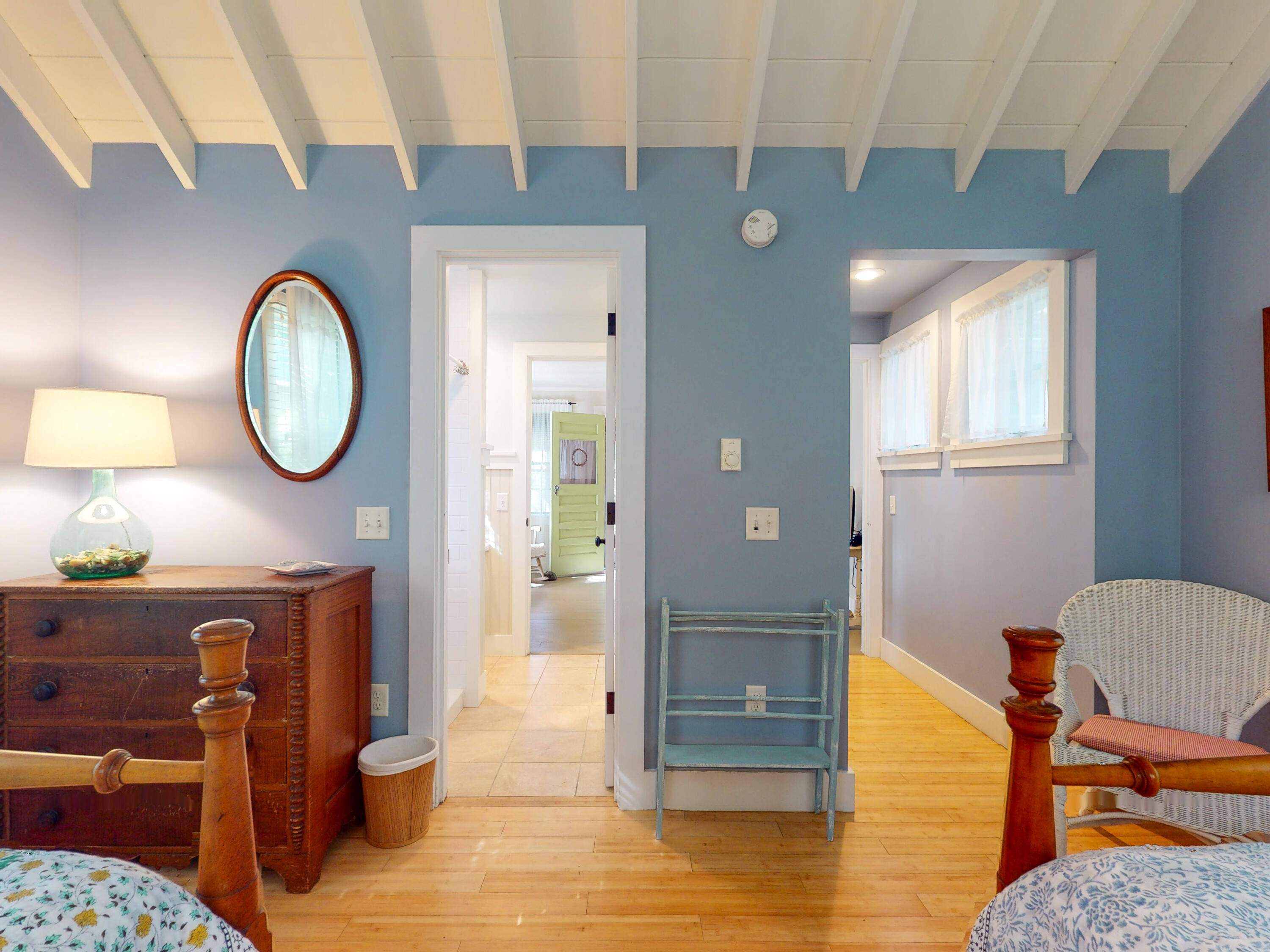 115 Cove Road Wellfleet, MA 02667 - Photo 40 of 49 a view of a livingroom with furniture wooden floor and a rug
