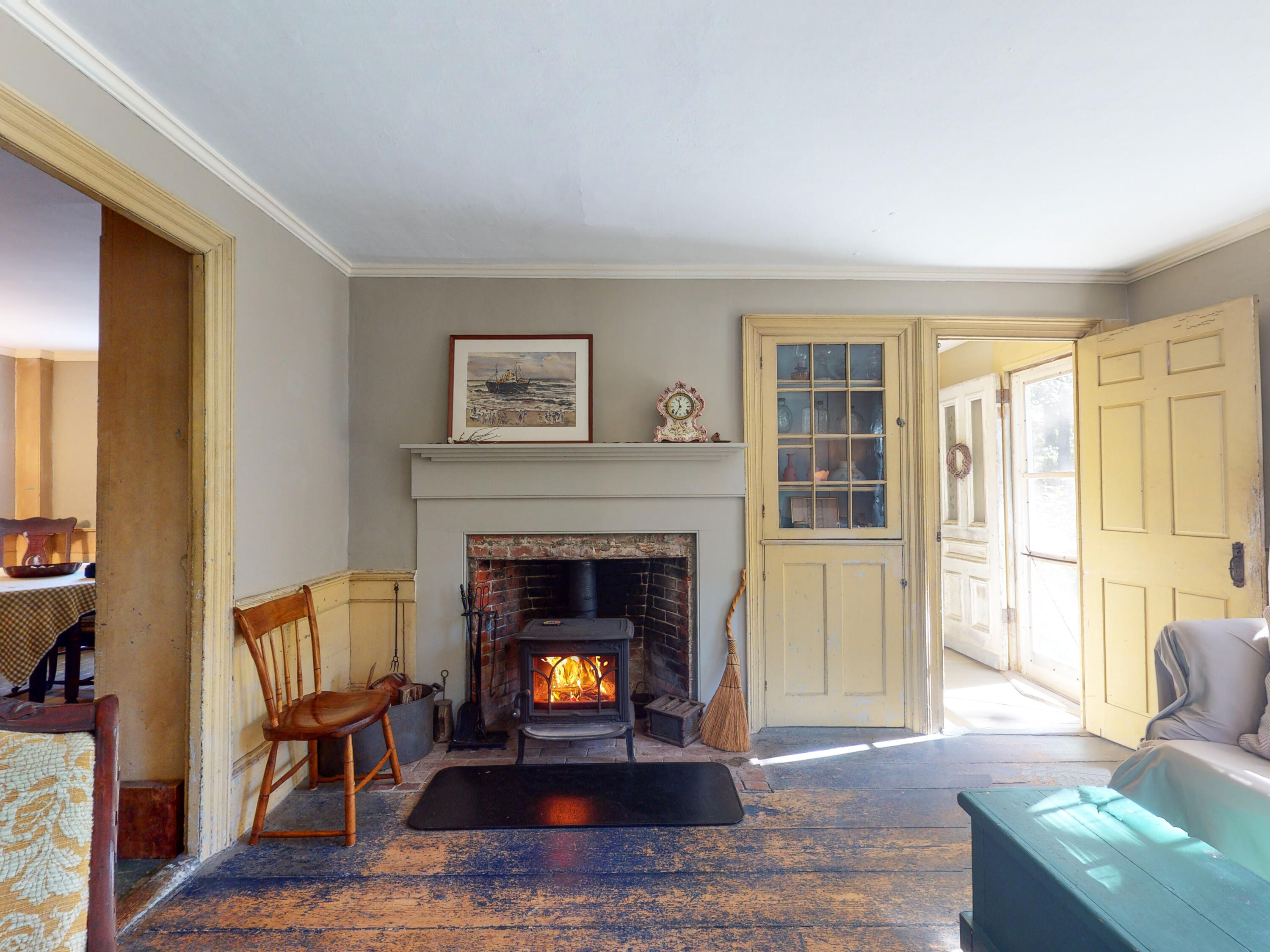 115 Cove Road Wellfleet, MA 02667 - Photo 5 of 49 a living room with furniture and a fireplace