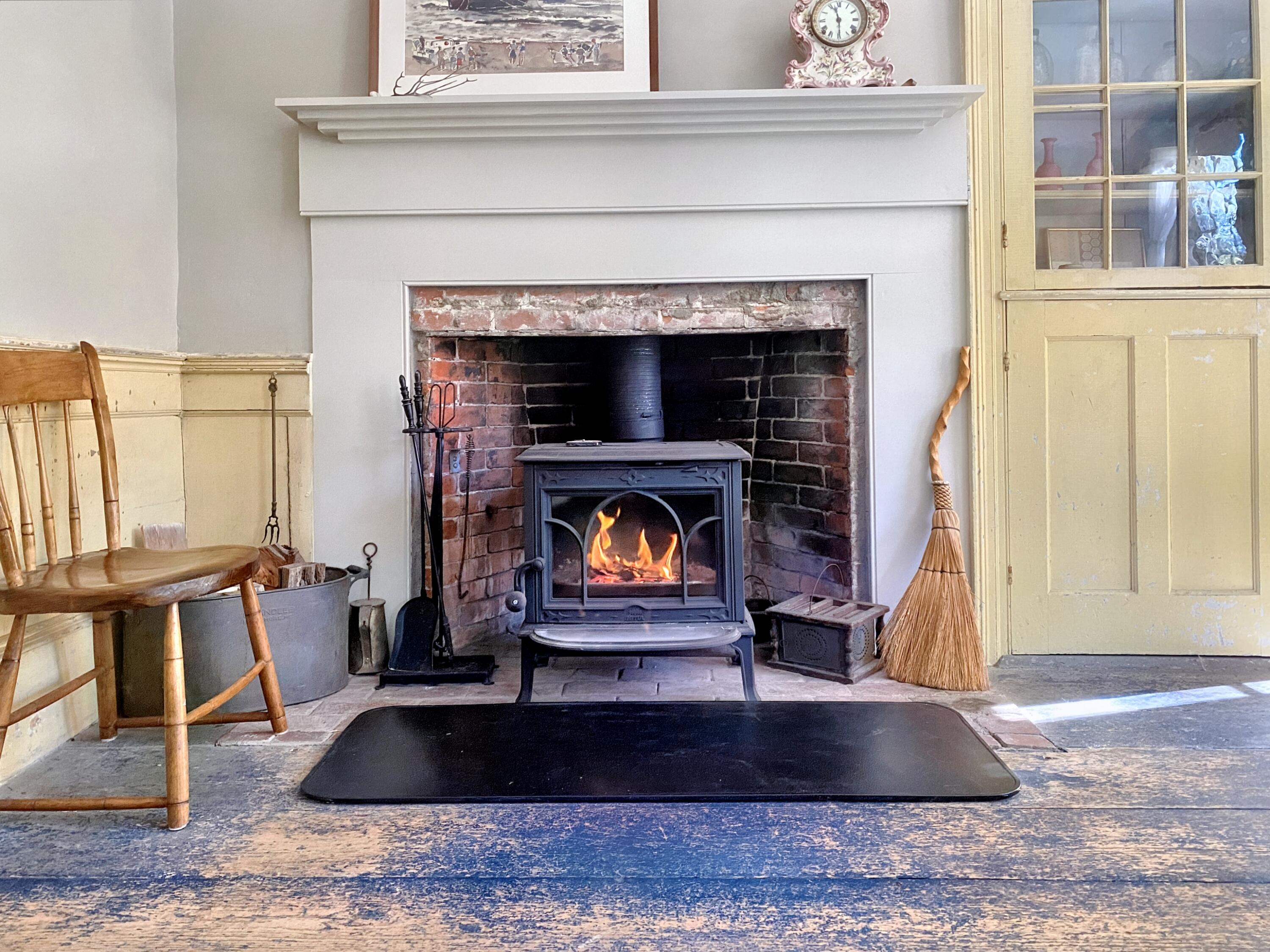 115 Cove Road Wellfleet, MA 02667 - Photo 6 of 49 a living room with furniture and a fireplace