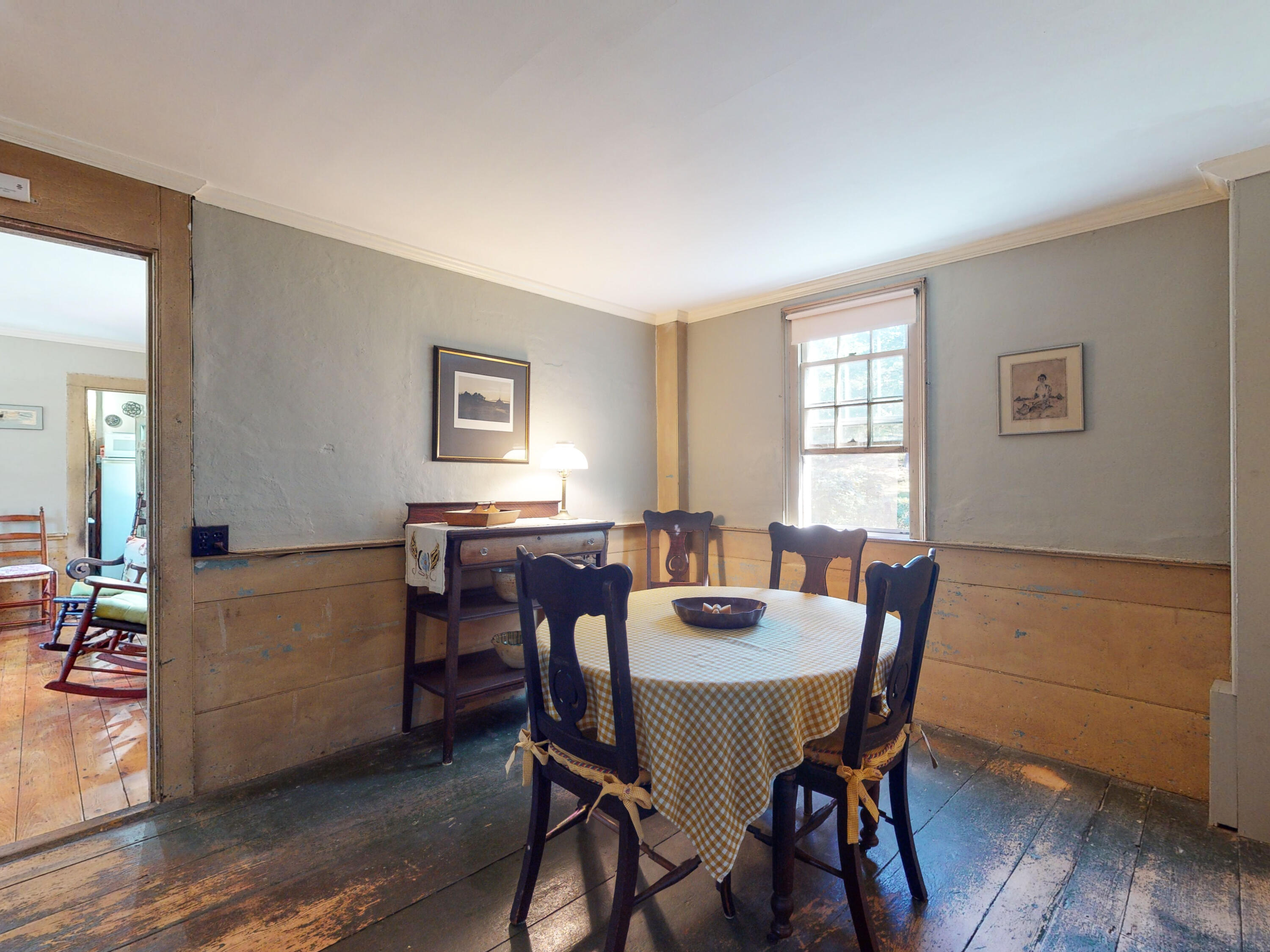 115 Cove Road Wellfleet, MA 02667 - Photo 8 of 49 a view of a dining room with furniture and wooden floor