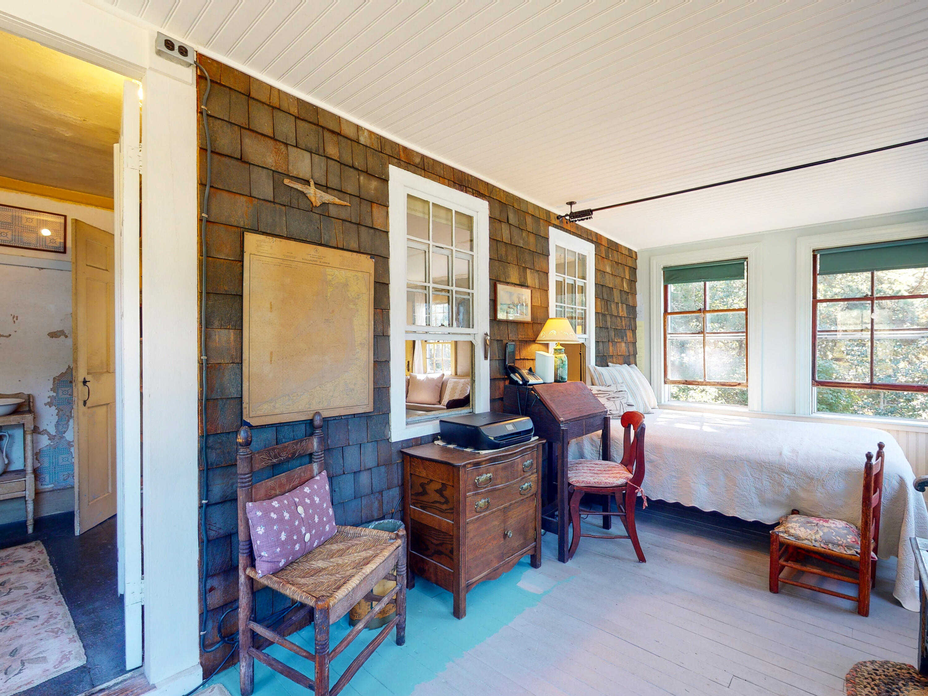 115 Cove Road Wellfleet, MA 02667 - Photo 10 of 49 a bedroom with furniture and a window