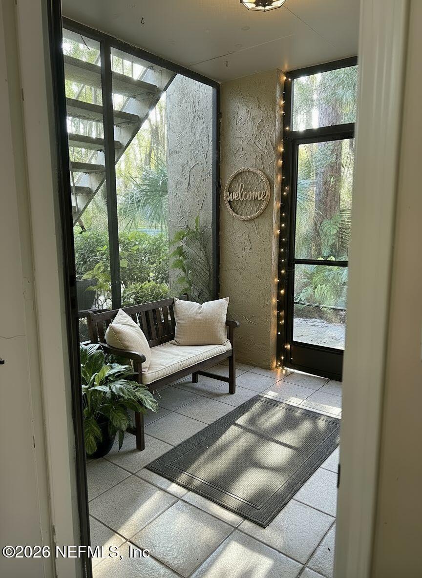 3801 Crown Point Road, Unit 3081 Jacksonville, FL 32257 - Photo 2 of 34 a living room with furniture and a window