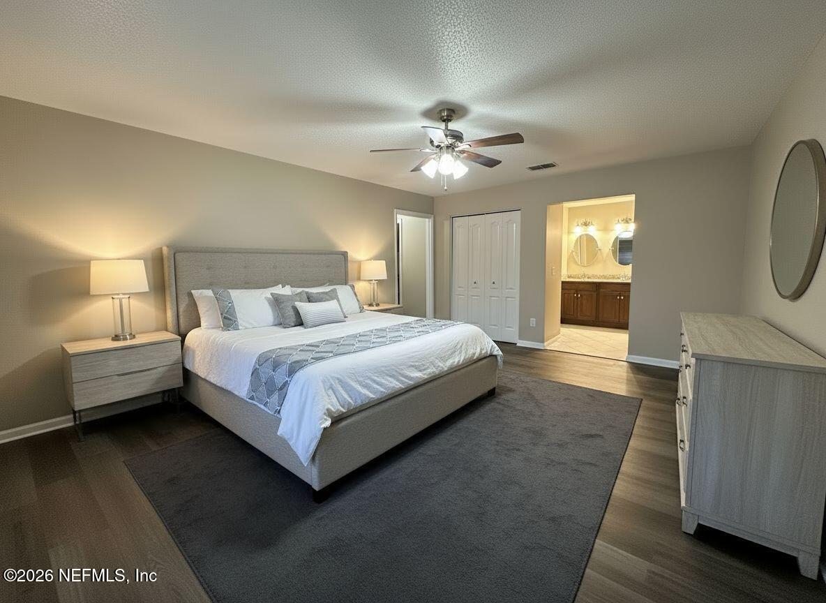 3801 Crown Point Road, Unit 3081 Jacksonville, FL 32257 - Photo 23 of 34 a bedroom with a bed chandelier and a window