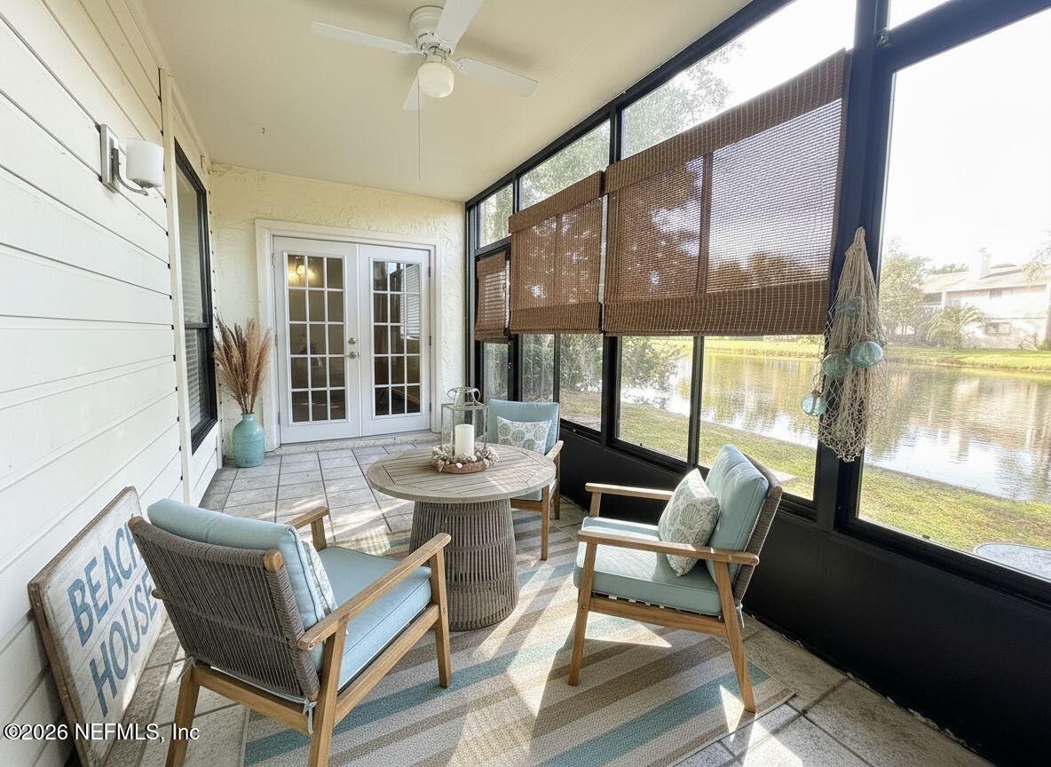 3801 Crown Point Road, Unit 3081 Jacksonville, FL 32257 - Photo 29 of 34 a living room with furniture and a large window