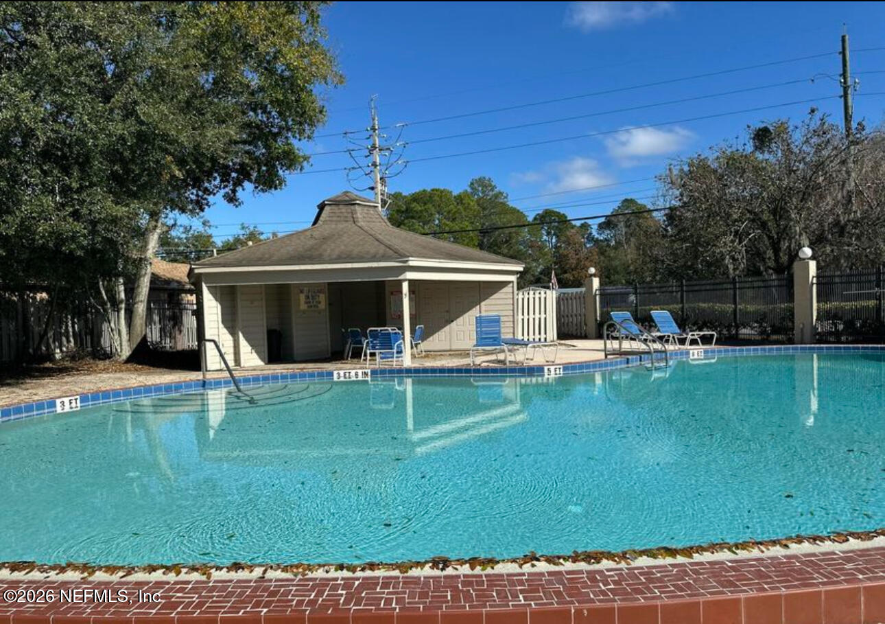 3801 Crown Point Road, Unit 3081 Jacksonville, FL 32257 - Photo 32 of 34 a view of house with swimming pool outdoor seating