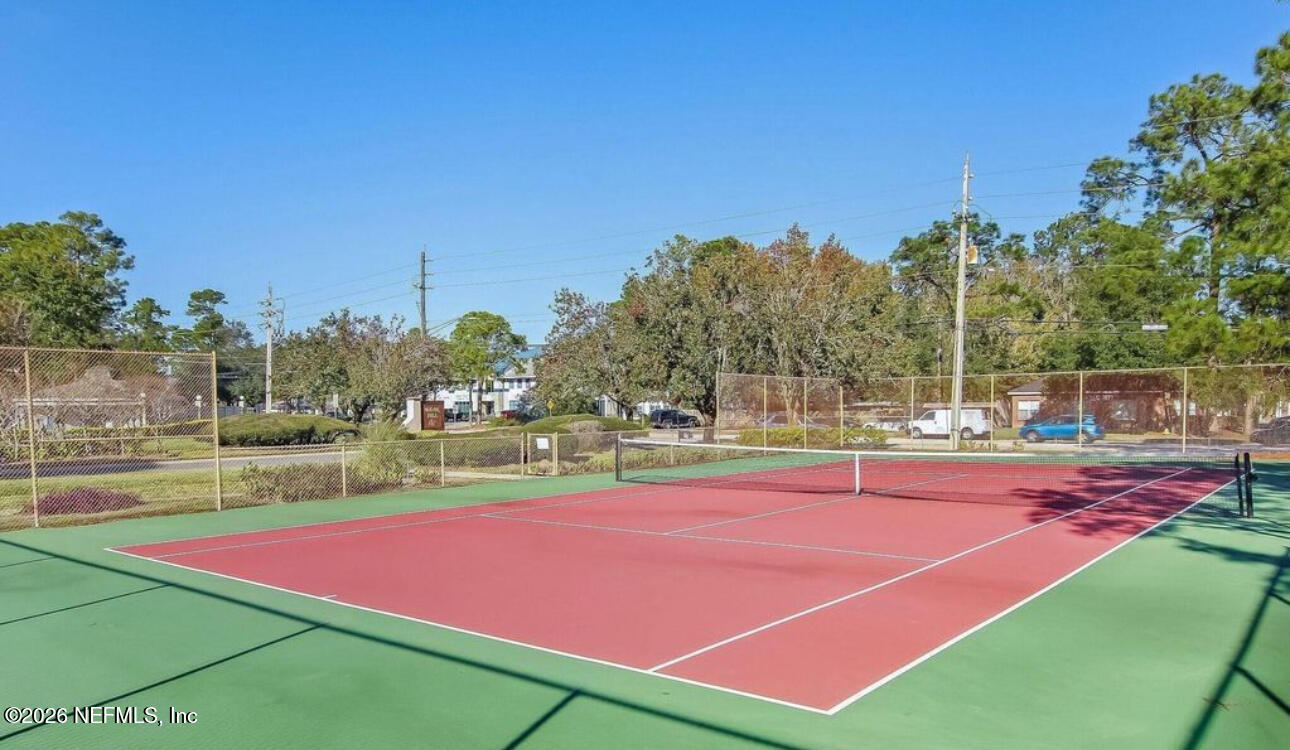 3801 Crown Point Road, Unit 3081 Jacksonville, FL 32257 - Photo 33 of 34 a view of a tennis court