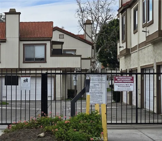 a house view with a street sign