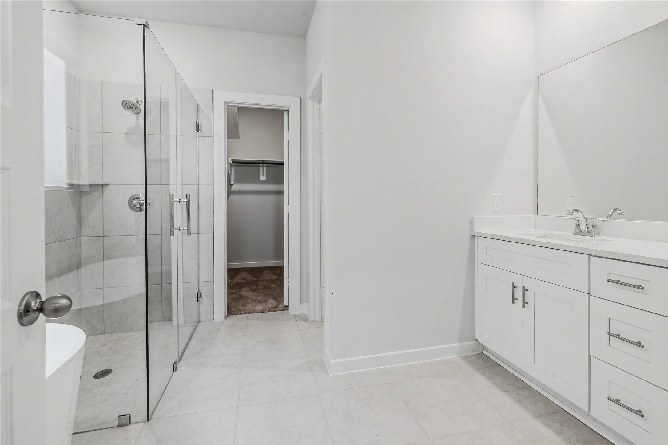 6423 Bolinas Court Rosharon, TX 77583 - Photo 22 of 39 a bathroom with a shower sink and mirror
