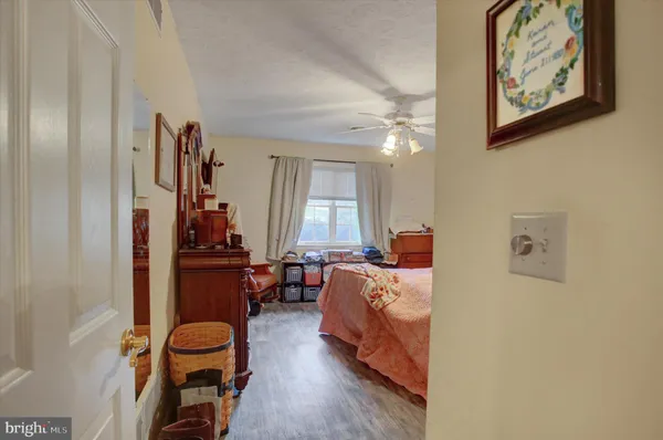 a bed room with furniture and a window