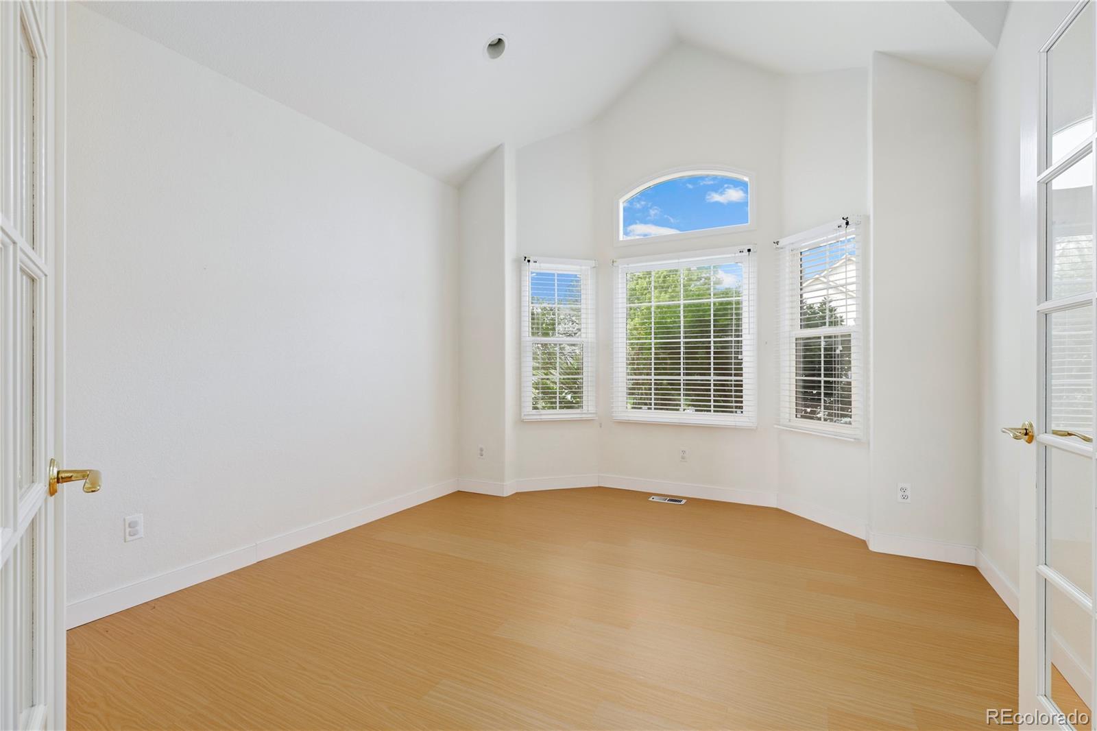 5662 South Nome Street Englewood, CO 80111 - Photo 11 of 47 a bedroom with a bed and window