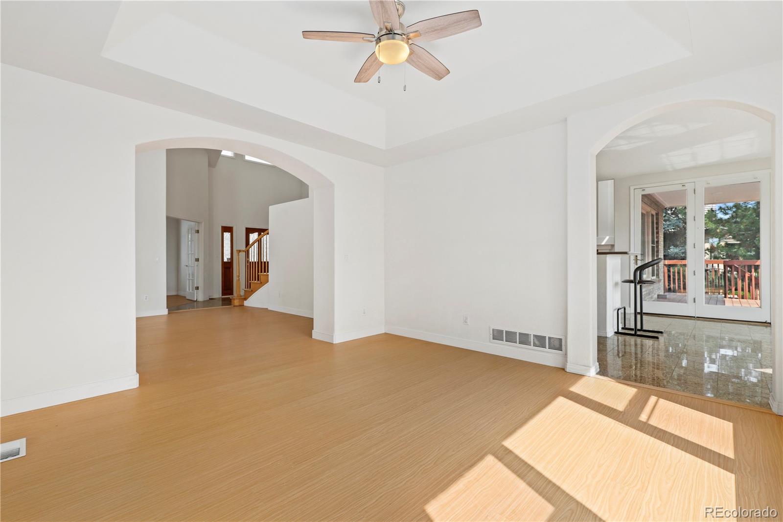 5662 South Nome Street Englewood, CO 80111 - Photo 15 of 47 a view of a room with a ceiling fan
