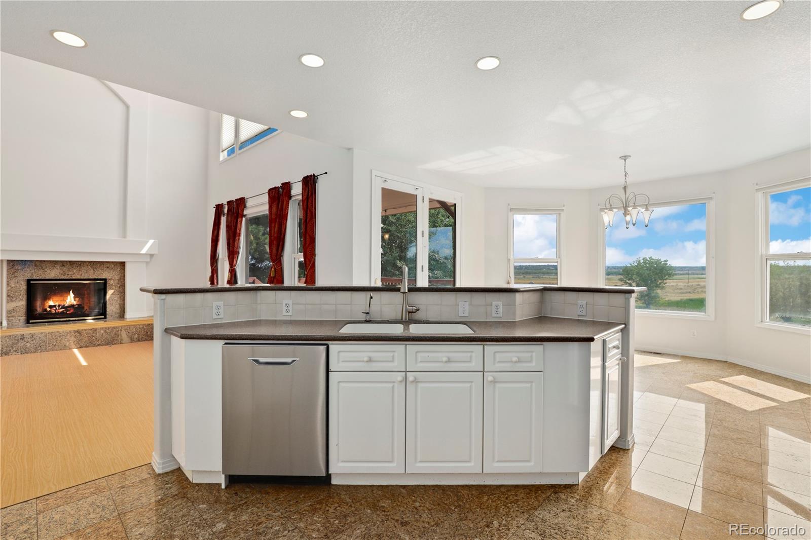 5662 South Nome Street Englewood, CO 80111 - Photo 18 of 47 a bathroom with a sink and a mirror