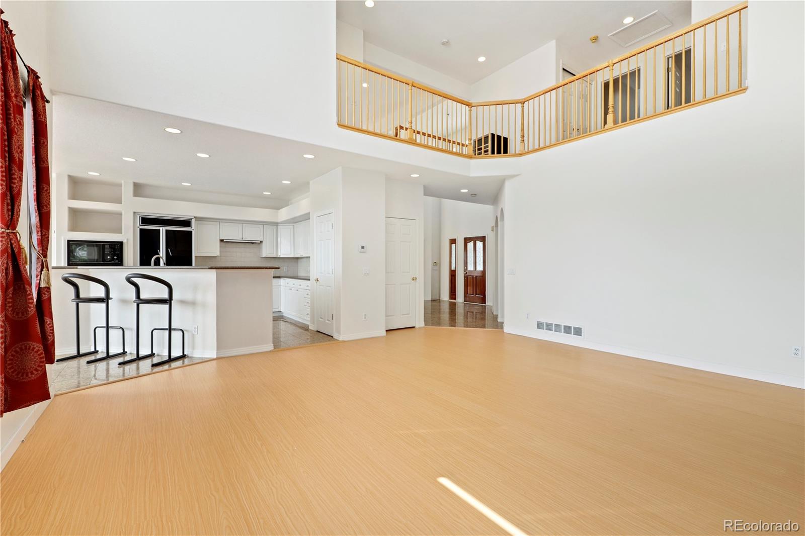 5662 South Nome Street Englewood, CO 80111 - Photo 22 of 47 a view of a kitchen with furniture and a kitchen
