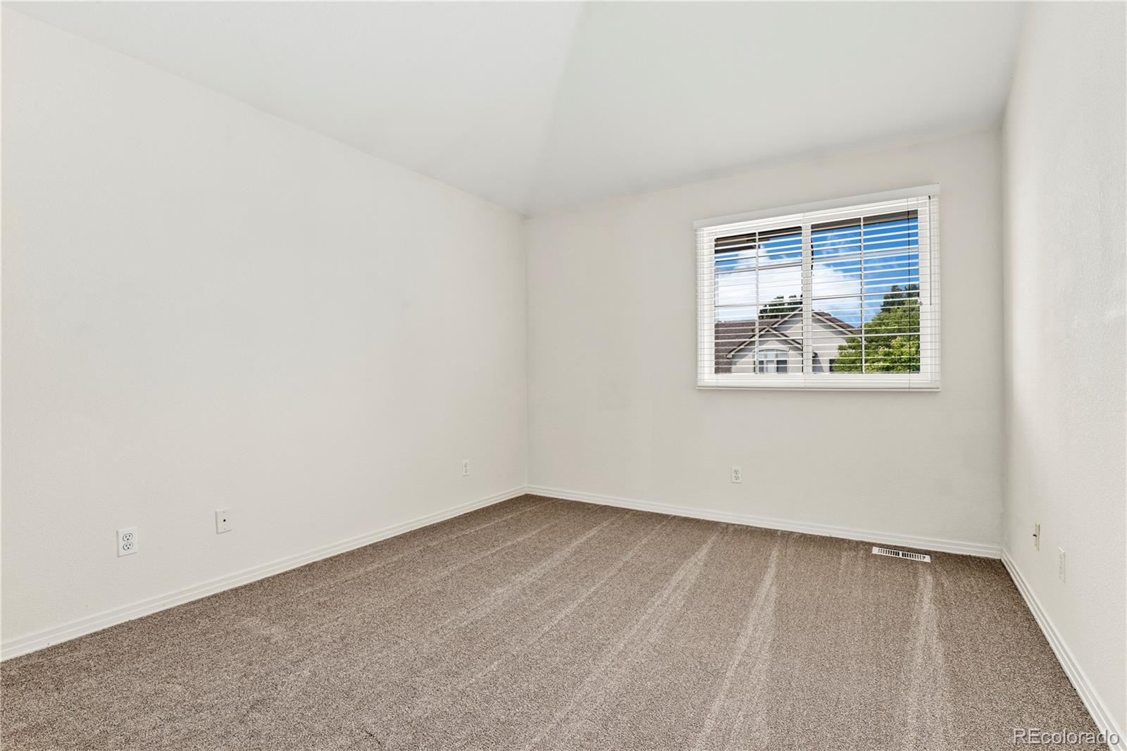 5662 South Nome Street Englewood, CO 80111 - Photo 27 of 47 an empty room with a window