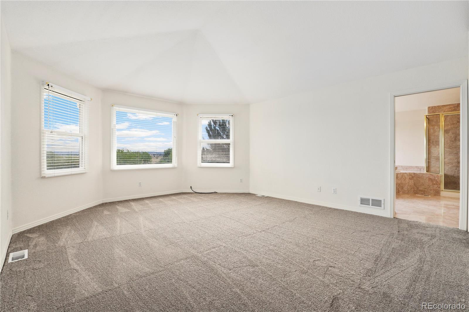 5662 South Nome Street Englewood, CO 80111 - Photo 31 of 47 an empty room with windows