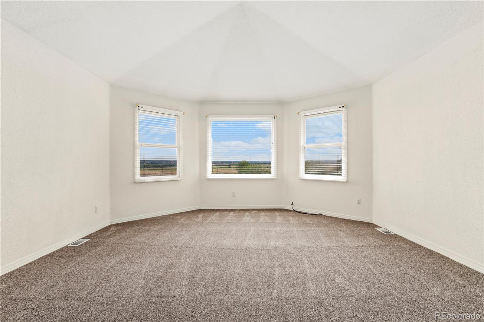 5662 South Nome Street Englewood, CO 80111 - Photo 33 of 47 an empty room with windows