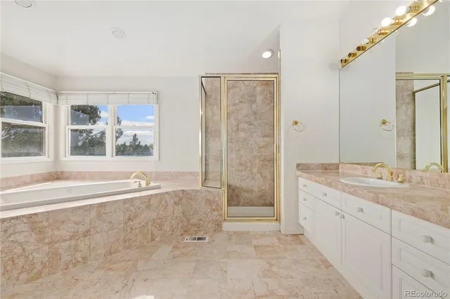 an empty room with staircase and white door